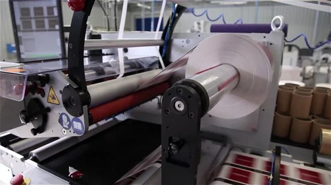 Roll with paper being printed in a printing press, slider shot Stock Footage 57286369