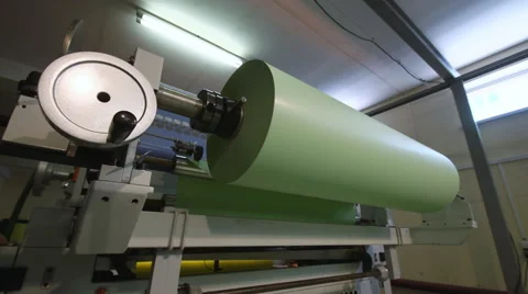 Roll of paper in the machine for printing newspapers Stock Footage 40537962
