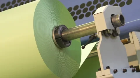 Roll of paper in the machine for printing newspapers Stock Footage 40538143