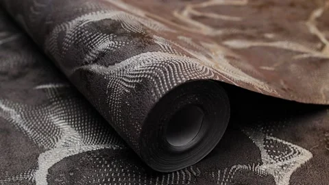 Roll of paper wallpaper on the wall with texture, camera movement slowly 库存影片 306543508