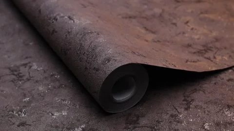Roll of paper wallpaper on the wall with texture, camera movement slowly 库存影片 306543769