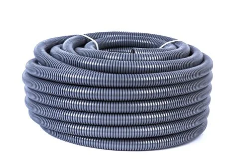 Roll of plastic corrugated pipe for electrical installation isolated on white Stock Photos