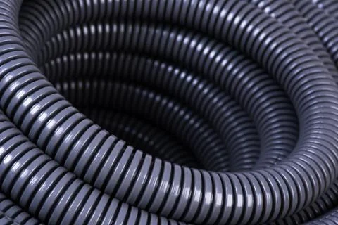 Roll of plastic corrugated pipe for electrical installation Stock Photos