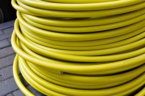 Roll of plastic yellow cable, texture Stock Photos
