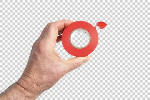 A roll of red electrical tape in the hand Stockfoto's
