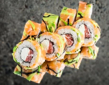 Roll with salmon, avocado, grapefruit Stock Photos