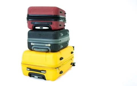 Roll, Stack of Rolling luggage, travel suitcase isolated on white background. Stock Photos