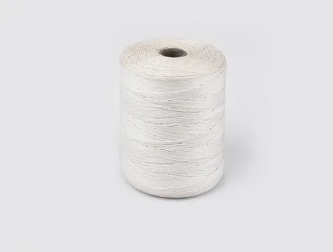 Roll of thin string on a white background Stock Photos