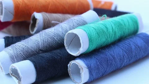 Roll of thread rotate background Stock Footage 125976635