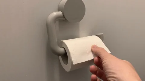 Roll toilet paper off the roll Stock Footage 109590954