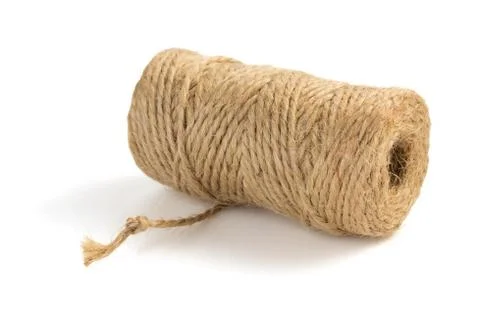 Roll of twine cord and thread  on white Stock Photos
