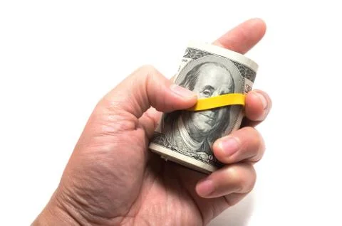 Roll of us banknotes with 100 dollars at the surface Stock-Fotos