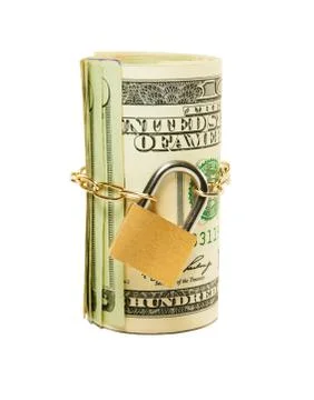 Roll of us dollars chained and locked Stock Photos