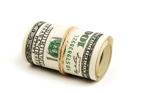 Roll of US dollars on a white background, isolated. Stock Photos