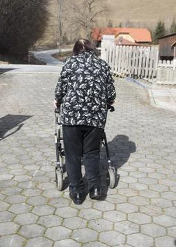 Rollator as a walking aid Stock Photos