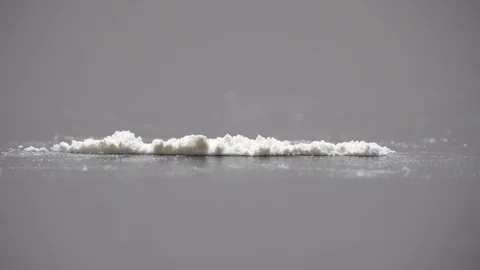 Rolled banknote snorting line of cocaine powder. Problems with drugs Vidéo 123660339