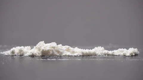Rolled banknote snorting line of cocaine powder. Problems with drugs Stock Footage 123660392