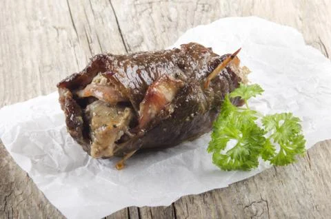 Rolled beef with stuffing and bacon Stock Photos