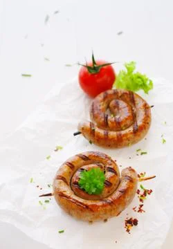 Rolled bratwurst Stock Photos