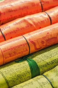 Rolled up Buddhist prayer flags for sale, Kathmandu, Nepal Stock Photos