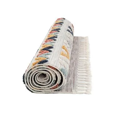 Rolled carpet with pattern on white background. Interior element Foto stock