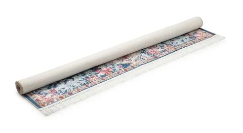 Rolled carpet with pattern on white background. Interior element Stock Photos