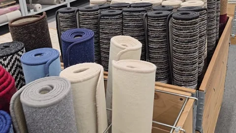 Rolled carpets on display in a store Stock Footage 342027598