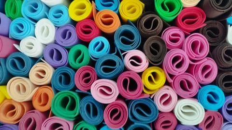 Rolled Colorful Foam Sheets Background Stock Photos