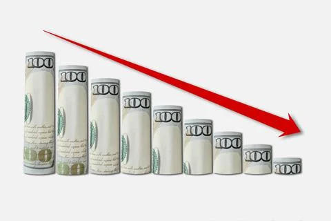 Rolled up dollar bills falling graph with red down arrow. Stock Photos