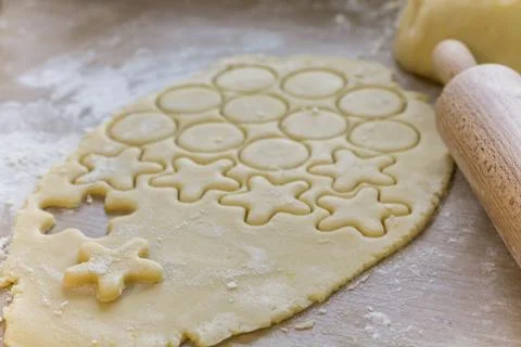 Rolled Dough on the Table with Rolling Pin. Bakery products. Stock Photos