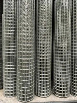 Rolled galvanized mesh with welded connections available in a supermarket s.. Stock Photos