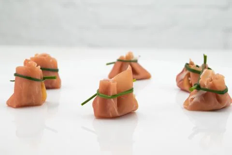 Rolled ham and chive Stock Photos
