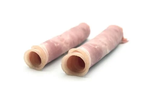 Rolled ham on white background Stock Photos