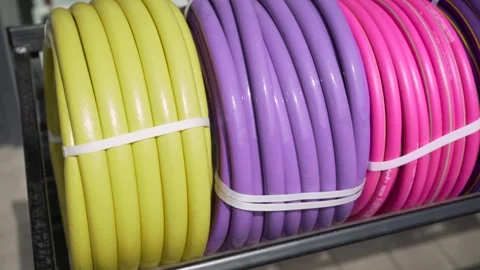 Rolled hoses are sold in the store. Stock Footage 248157239