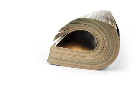 Rolled up magazines on a white background Stock Photos