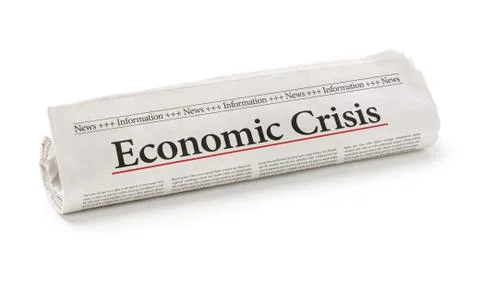 Rolled newspaper with the headline Economic Crisis Stock Photos