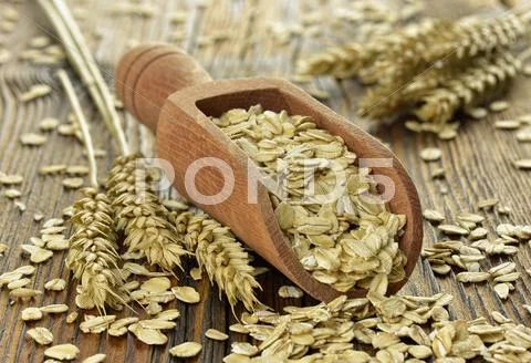 Rolled Oats On A Wooden Spoon