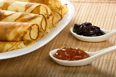 Rolled pancakes Stock Photos