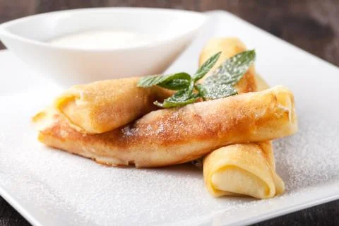 Rolled pancakes Stock Photos