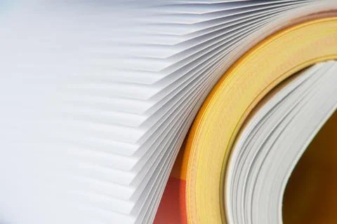 Rolled up paper with focus on edge Stock Photos