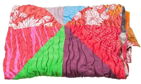 Rolled patchwork scarf isolated on white rolled patchwork scarf isolated o... Stock-Fotos