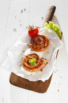Rolled sausage Stock Photos
