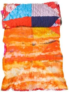 Rolled silk batik and patchwork scarf isolated Stock Photos