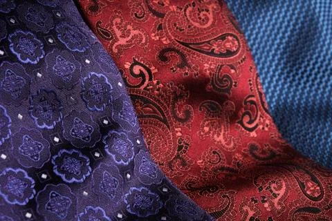 Rolled silk ties close to each other Stockfoto's