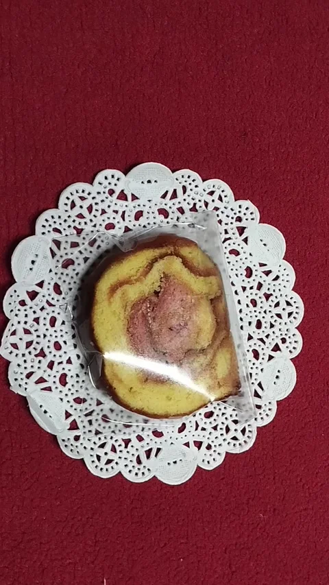 Rolled sponge cake in small pieces is very delicious Stock Footage 224246067