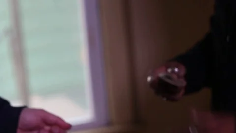 Rolled Stack of Money Changing Hands Stock Footage 77010110