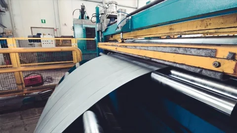 Rolled steel. Stack of rolls, cold rolled steel coils in action. Galvanized.. Stock Footage 327943697