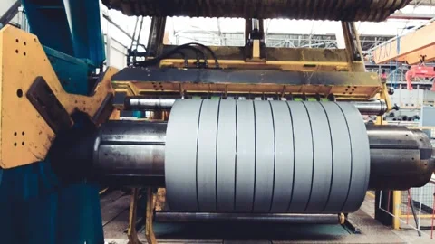 Rolled steel. Stack of rolls, cold rolled steel coils in action. Galvanized.. Stock Footage 327943839