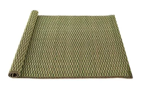 Rolled straw mat isolated Stock Photos