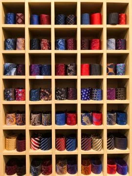 Rolled up ties in a shop Stock Photos